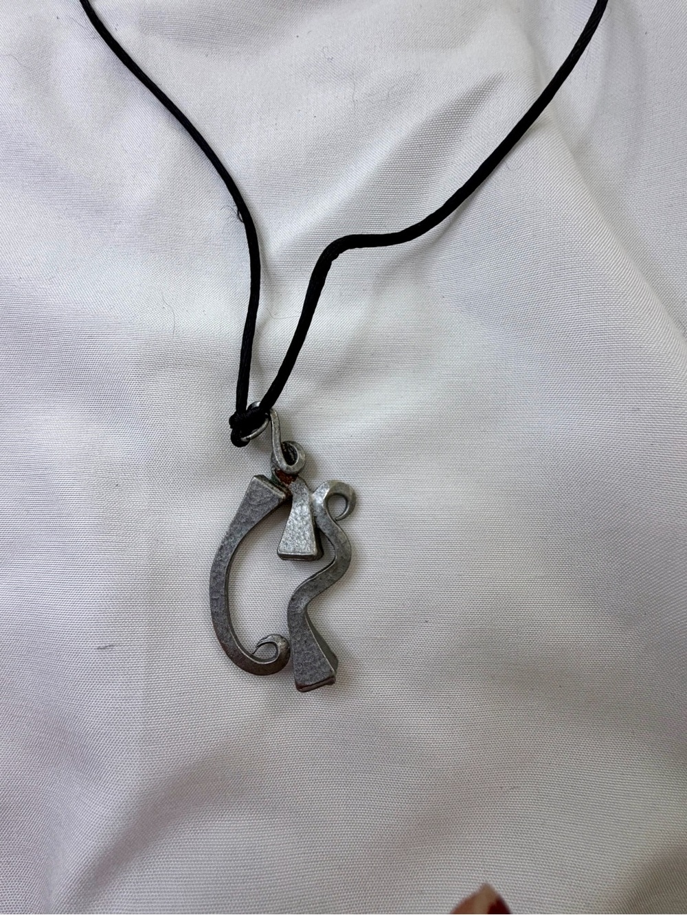 Silver Pendant Necklace on Black Cord